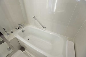 How to Patch or Fix a Hole in Tubs & Showers