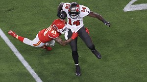 Breeland's pass interference penalty nets 34 yards for the Buccaneers