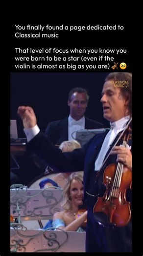 Classical Music Reels on Instagram: "There are talented musicians, and then there are legends in the making! 🌟 This iconic moment captures the incredible Akim Camara, a toddler violin prodigy, stealing the show alongside the “King of Waltz,” André Rieu. What makes this video absolute gold isn’t just the fact that a child this young has such command over the instrument—it’s his sheer intensity! Look at that “stank face” and the serious side-eye! 😂 While the audience dissolves into laughter and