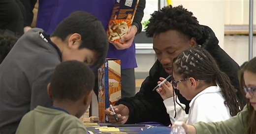 Baltimore Ravens players teach kids lesson in finance