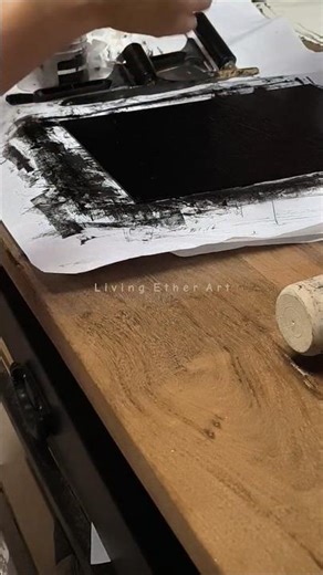 Manually pressing monotype print