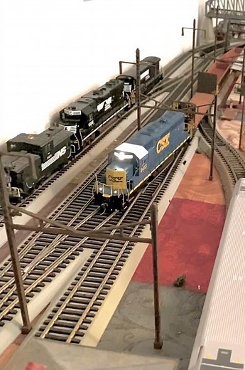 CSX SD40-2 Leads Past NS Light Move (HO Scale)