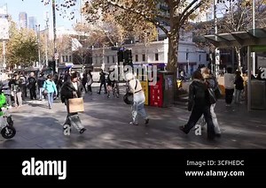 traffic and pedestrians on busy intersection