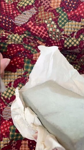 Granny sharpening Knife on a Whetstone