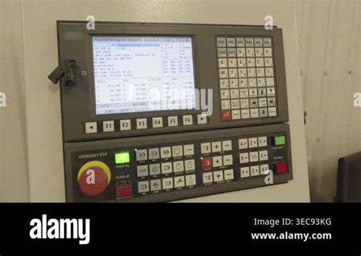 Control panel of a CNC machine with various buttons and a digital display screen Stock Video Footage - Alamy