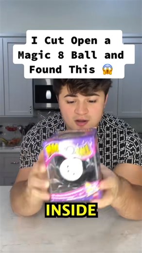 Cutting open a Magic 8 Ball exposes the secret hidden inside