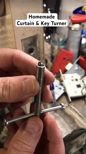 1121. Chubb mortice door lock opened by simply turning the key with a homemade curtain & key turner
