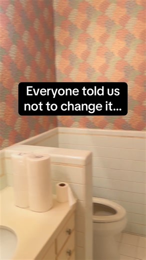 This powder room is about to have its moment. We kept the original 70s tile on the walls, countertops, and cabinets, replaced only the flooring — and now the wallpaper is about to tie it all together. I cannot wait to show you. #renovationproject #interiordesign #grandmillenialhome | The Hill House Edit