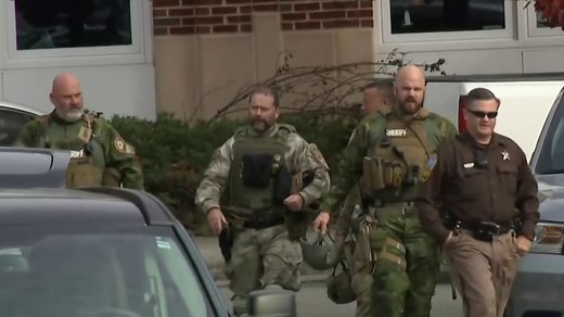 Urgent manhunt for missing Marine accused of murder in Virginia