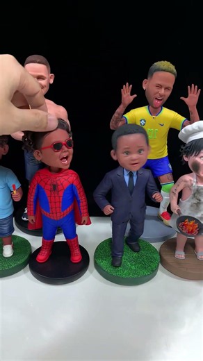 Handmade Clay Bobbleheads Bursting with Playful Joy