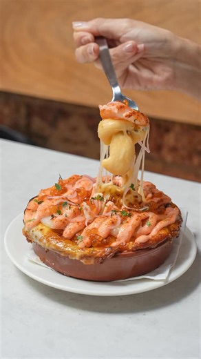 Clovelly on Instagram: "A plate of warmth: Gooey Mac&Cheese, served with seared prawns and kissed with mentaiko and luxurious ikura for an umami-rich twist 🤤🧀 Reservations available via link in bio or WhatsApp us at +65 8835 8987."