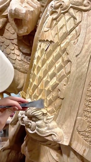 Detailed Hand Carving Process to Create Decorative Patterns on a Wood Block