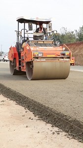 Road rolling is a critical process during road construction that eliminates air pockets and weak spots by increasing the density of the materials, making the road foundation strong, stable, and durable. Proper rolling improves load-bearing capacity, prevents early cracks, potholes, and surface failure, and extends the lifespan of the road. In this video, you can see the road rolling process in one of MEIL Group’s road projects. Although this process looks simple, it is crucial in the road laying