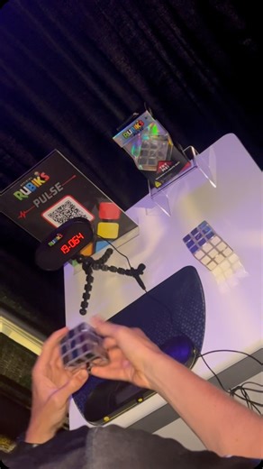 Rubik’s on Instagram: "Rubik’s Pulse (+ timer 👀) preview at the Rubik’s Cube World Championship! Come check it out at the Rubik’s Booth and try to solve before it’s lights out 💡#rubiks #speedcubing #pulse #rubikspulse"