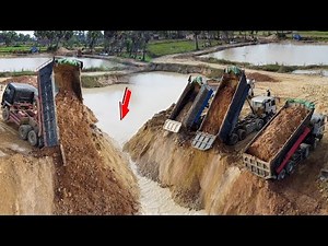 Wonderful filling Land Processing! Dump trucks unloading soiled into water for fill up land