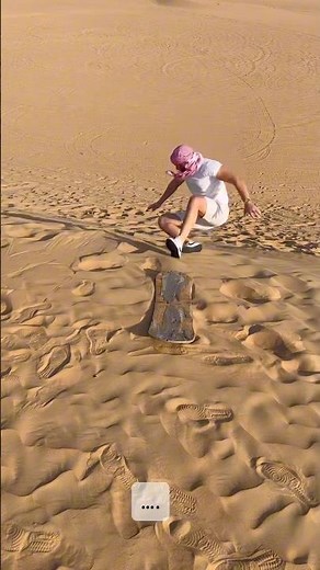 Demonexion sandboards for the first time! He eats sand..