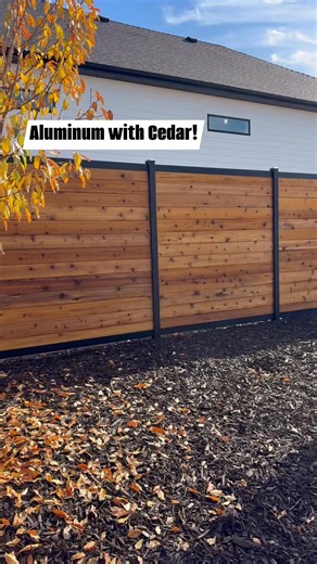 1.4K views · 33 shares | Black Aluminum with Cedar Slats = one serious sleek fence! It’s unique and turns heads!  Would you add this look to your yard? #broncofence #aluminumfence #modernfence #backyardstyle | Bronco Fence | Facebook