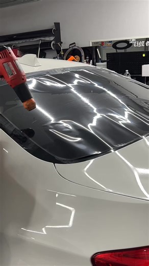 Window tint installation on this bmw 550i rear windshield this film SHRINKS like BUTTER | Jena Johnston