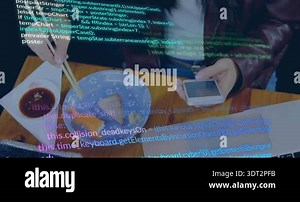 Young woman eats Sushi and Asian food in a restaurant - close up shot