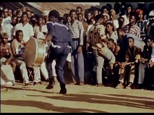 Beautiful sounds and dance moves from The Ivory Coast, circe 1958. Fascinating mix of frame drums and marching band bass drums. (via twitter.com/dusttodigital) | African Drumming