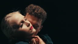 Couple is immersed in loving atmosphere showing tenderness to each...