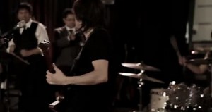 Bride playing Master of Puppets on her wedding day