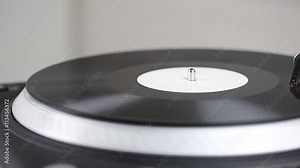 DJ needle on spinning turntable. Listening the music