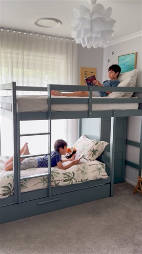 Fiona on Instagram: "We were worried that a bunk bed would be too bulky, but the Aron Single Storage Bunk Bed with Trundle actually creates more storage and usable space! I love that the bottom bunk is extended out so you can comfortably sit at the end of the bed without having to duck your head and Harry is so excited about inviting friends for a sleepover. The @luxolivingau Xmas Rush Home Sale is on at the moment and could save you $250! 🤭 Which room is on your wishlist for an update? #luxoli