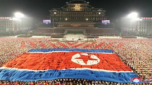 Kim Jong Un oversees North Korea celebrations with huge parade