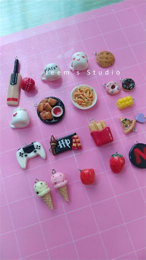 Jeem's Studio on Instagram: "Been working on this beauty since October. A detailed custom family order, personalized for individual tastes. Finally wrapped up.💕 . Made with cold porcelain Clay ✨ DM to Order 🇵🇰 💖 . . . . [Clay charms , miniature Food, keychains , bag charms ] #clayart #clay #handmade #art #artist #claycreations #airdryclay #reels #reelsinstagram #cute #miniaturefood #foodie #pakistan #love #jeemstudiopk #tealover"