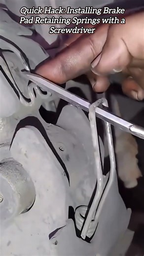 Quick Hack: Installing Brake Pad Retaining Springs with a Screwdriver #shorts #mechanic #automobile