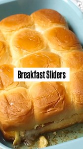 Breakfast Sliders -- These delicious ham, egg and cheese breakfast sliders served warm out of the oven are sure to make any morning better! Perfect for holiday brunch or feeding a crowd! Ingredients: 1 sheet slider buns 6 slices ham 6 slices cheese 12 eggs 1/2 - 1 cup melted butter #sliders #breakfastideas | The Soccer Mom Blog - Positive Inspiration for Moms