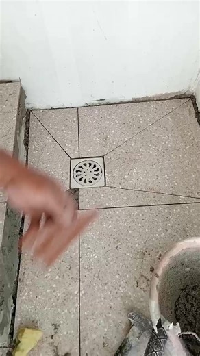 installing tile around floor drain