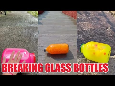 Breaking glass bottles ⚠️🔥 Crushing Crunchy & Soft Things ! #ASMR #Bottle #Shorts #satisfying