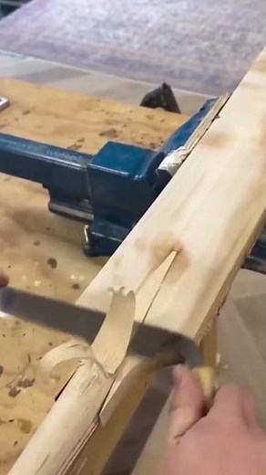 the process of scraping or using a chisel to punch wood planks.
