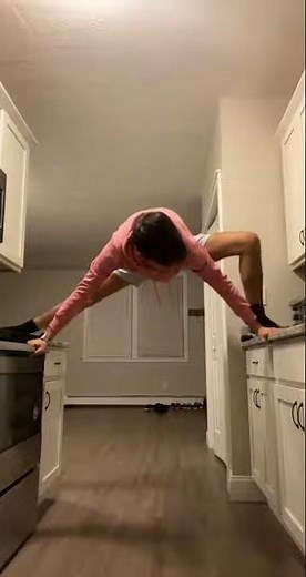 Person tries to do splits across the kitchen and falls!