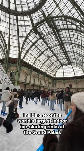 Inside one of the world’s largest indoor ice-skating rinks at the Grand Palais — a historic 1900s glass-roofed showplace turned winter wonderland. 🧊 The Eiffel Tower might sparkle at night, but here the ice shines brighter when skates carve through it. Ever tried gliding under a cathedral of light and steel without falling (too much)? | Paris in Pictures