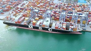 CHONBURI THAILAND MAY 17 2021 The MSC Time lapse Aerial top view of cargo ship carrying container for import and export goods to customer,concept logistic and supply chain