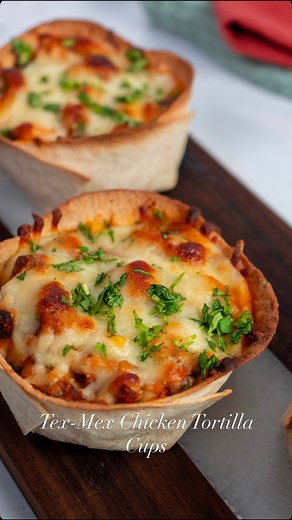 Lazy Dinner Episode 5 💛 You’ve never shaped a tortilla like this before 👀 These Tex-Mex Chicken Tortilla Cups aren’t just easy — they’re genius. A few quick cuts, a simple fold, and you’ve got the cutest little edible cups ready to fill with cheesy Tex-Mex goodness. No pre-cooking. No fuss. Just mix, fold, bake, done. The full recipe is here https://shicocooks.com/recipe/tex-mex-chicken-tortilla-cups/ Or comment ‘dinner’ below and I’ll send it straight to your inbox.💌 After my Salmon & Spinac