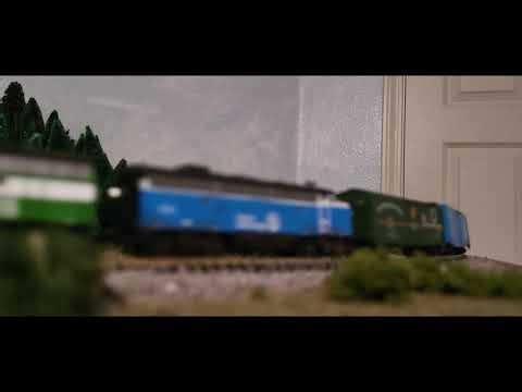 Running the new Northern Pacific head end boxcar on an early BN passenger train.