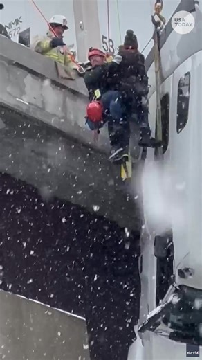 It's a holiday miracle! This driver was rescued from a truck dangling over a bridge in Southside, West Virginia, after being trapped in the cabin for hours, according to officials. | Detroit Free Press