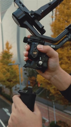 Peter Yan on Instagram: "Spent 24 hours running around Tokyo testing out the new DJI RS 5, and honestly, the workflow speed is what stood out most. ⚡️ When you’re moving between subway stations and crowded streets, the 2nd-Gen Automated Axis Locks are a lifesaver, it’s ready to shoot the second you pull it out of the bag. I spent most of the day using the Enhanced Intelligent Tracking to keep focus while weaving through the crowds, and the new Electronic Briefcase Handle made those low-angle str