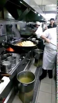 Giant Wok Cooks Food for 60 People