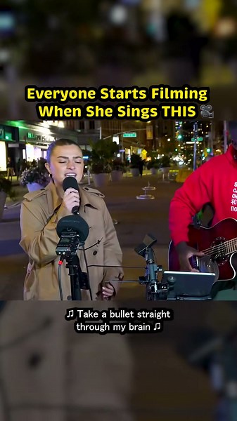 The whole crowd starts filming when she sings!