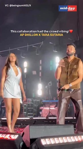 Yesterday, at AP Dhillon’s Pune concert, Tara Sutaria joined him on stage for a live performance of Thodi Si Daaru, a song they had collaborated on. The surprise appearance became one of the highlights of the night. VC: beingsumit01/X (AP Dhillon, Tara Sutaria, Concert, Thodi Si Daaru) | MiD DAY