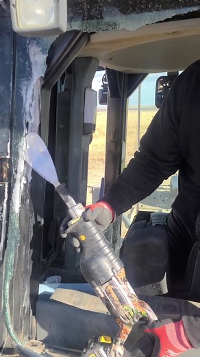 Man, some of the toughest urethane I've dealt with. Had to get a little spicey on this one. Tech Tip- Spray the tempered glass with foaming glass cleaner to help it not fly everywhere! @iron.mike.sharp gfym #fyp #bluecollar #autoglass #peakviewautoglass #coloradosprings #heavyequipment