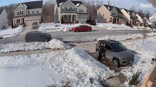 Rhythmically melting roof snow aims for parked car