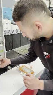 Do you know how to properly change the lens on a laser cutting table?