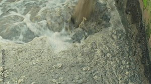 Discharge of waste water into segment clarifier biological purification of water sewage treatment plant, bubbles tank, activated sludge wastewaters process aeration and biology floc composed bacteria Stock Video