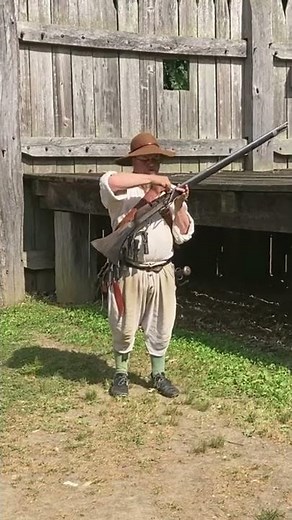 Musketeer shooting a Matchlock